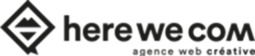 HERE WE COM Logo